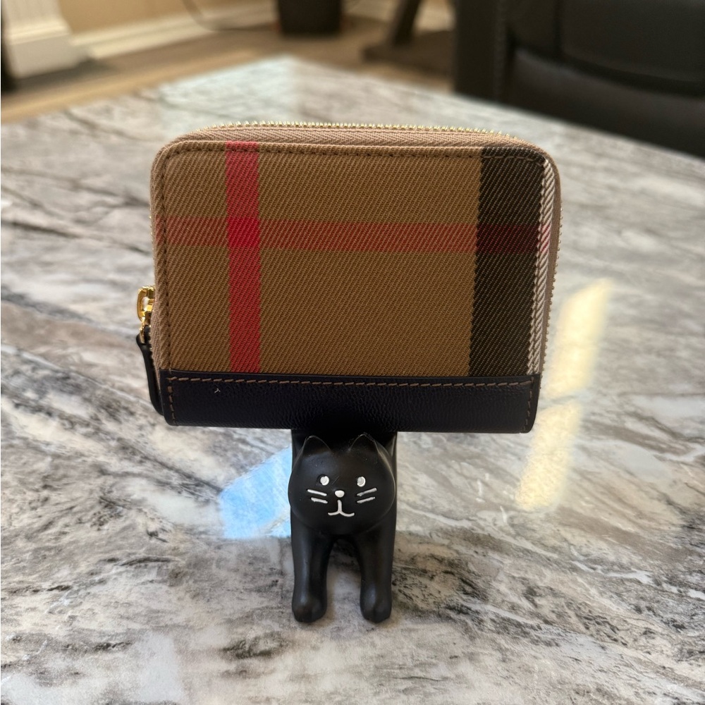 Burberry Tan and Red Plaid Wallet with Dark Canvas Blue spine.